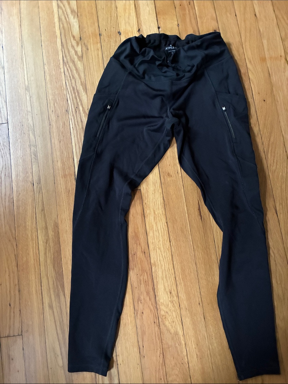 Athleta Black Women's Performance Leggings with Zippered Thigh Pockets